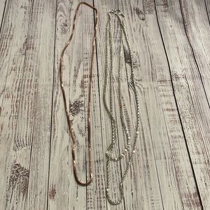 Copper and silver colored necklaces